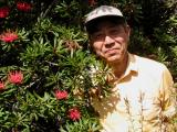 Prof. makita beside Waratah in flower